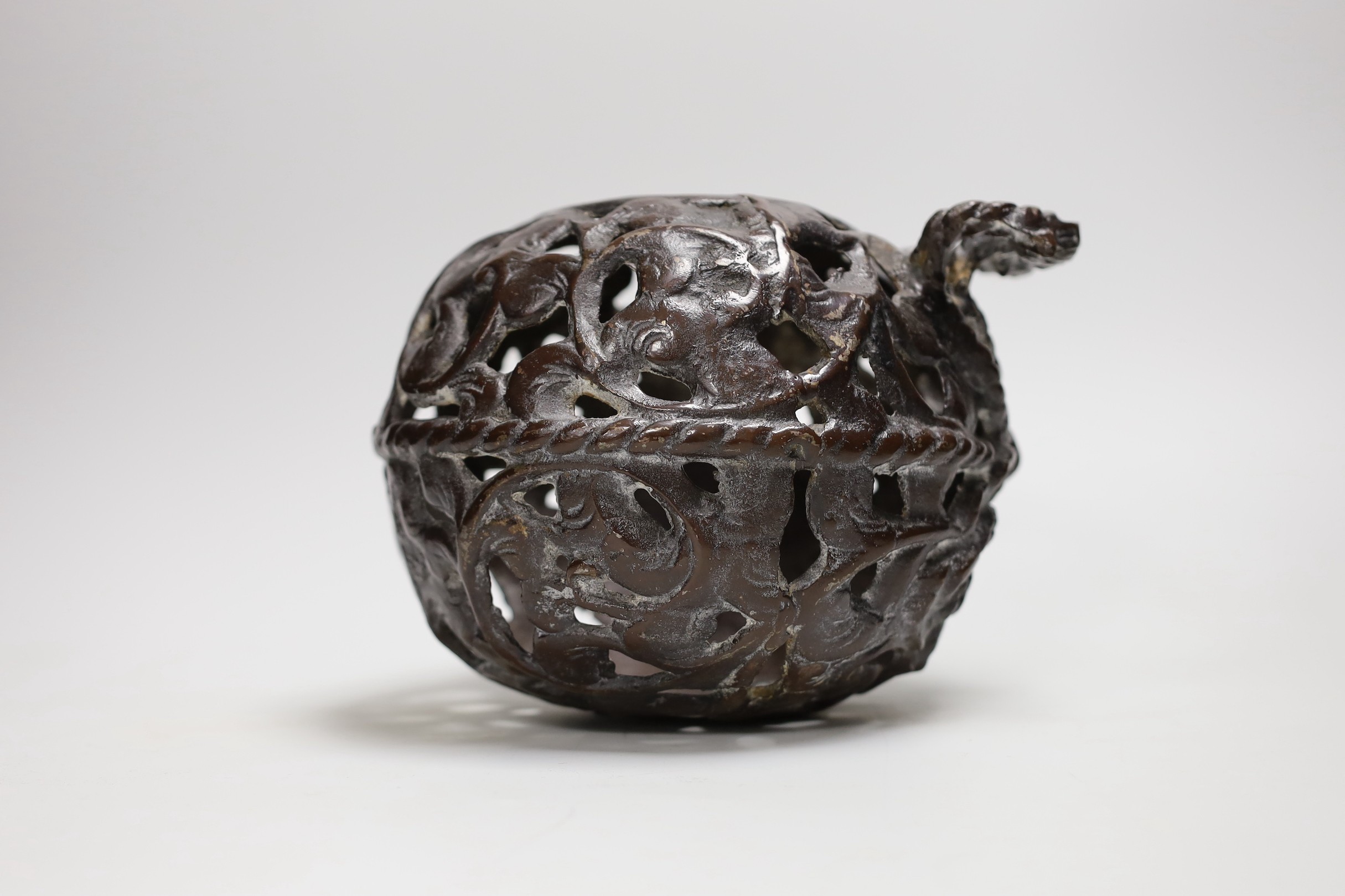 A bronze incense burner or basket, 15cm